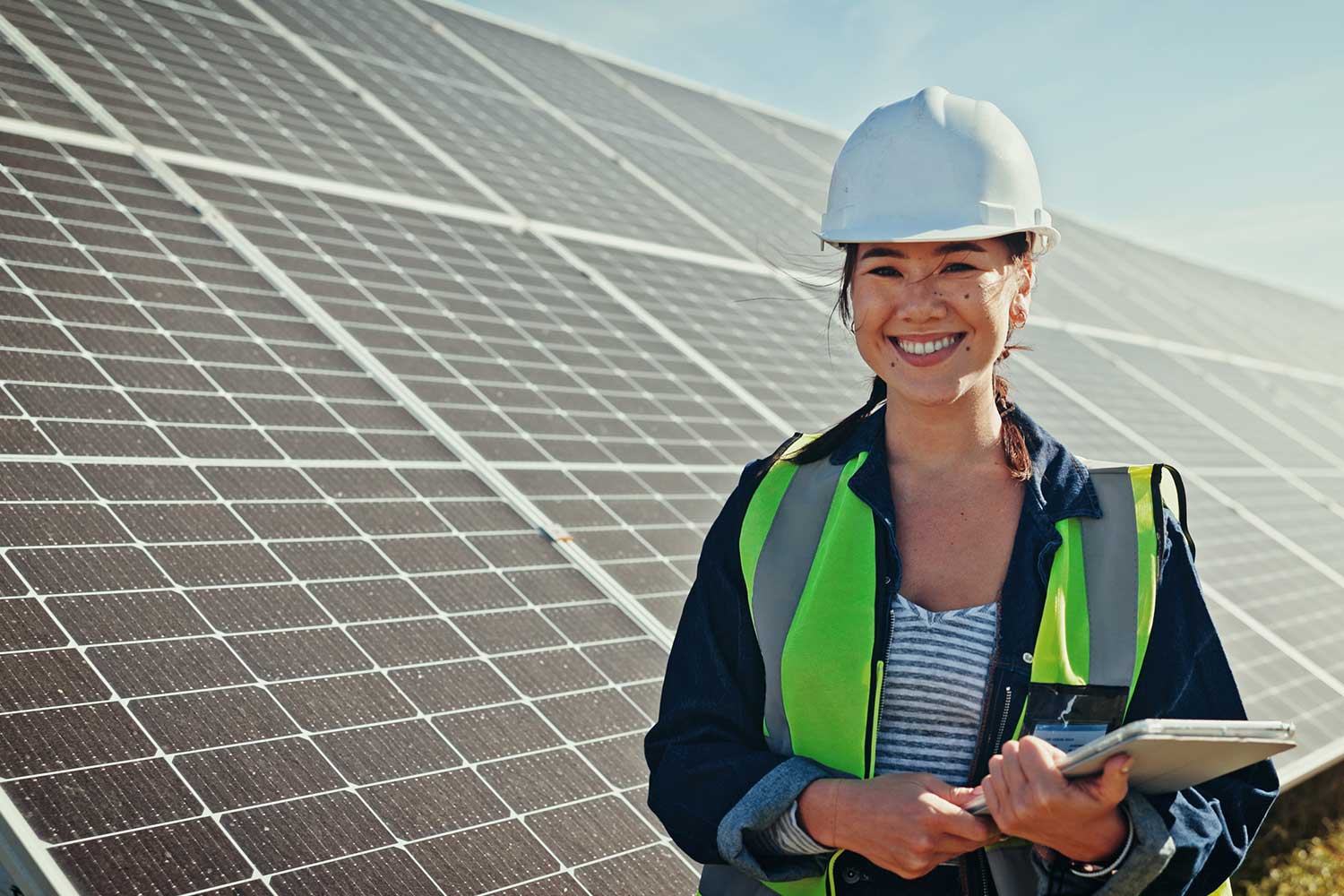 happy-woman-portrait-and-technician-with-tablet-fo-3FV7AL6
